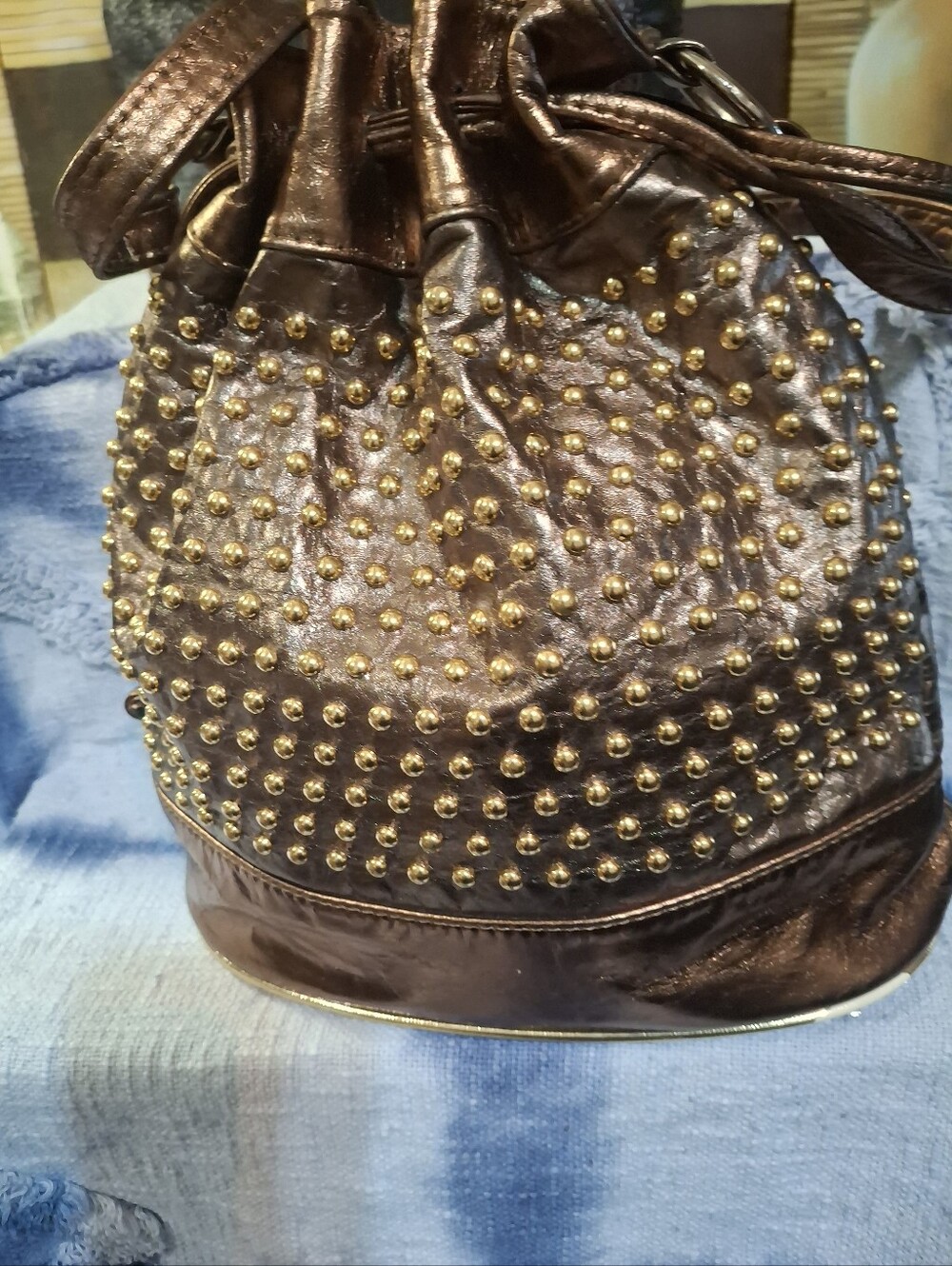 Metallic Brown Studded Drawstring Shoulder Bag